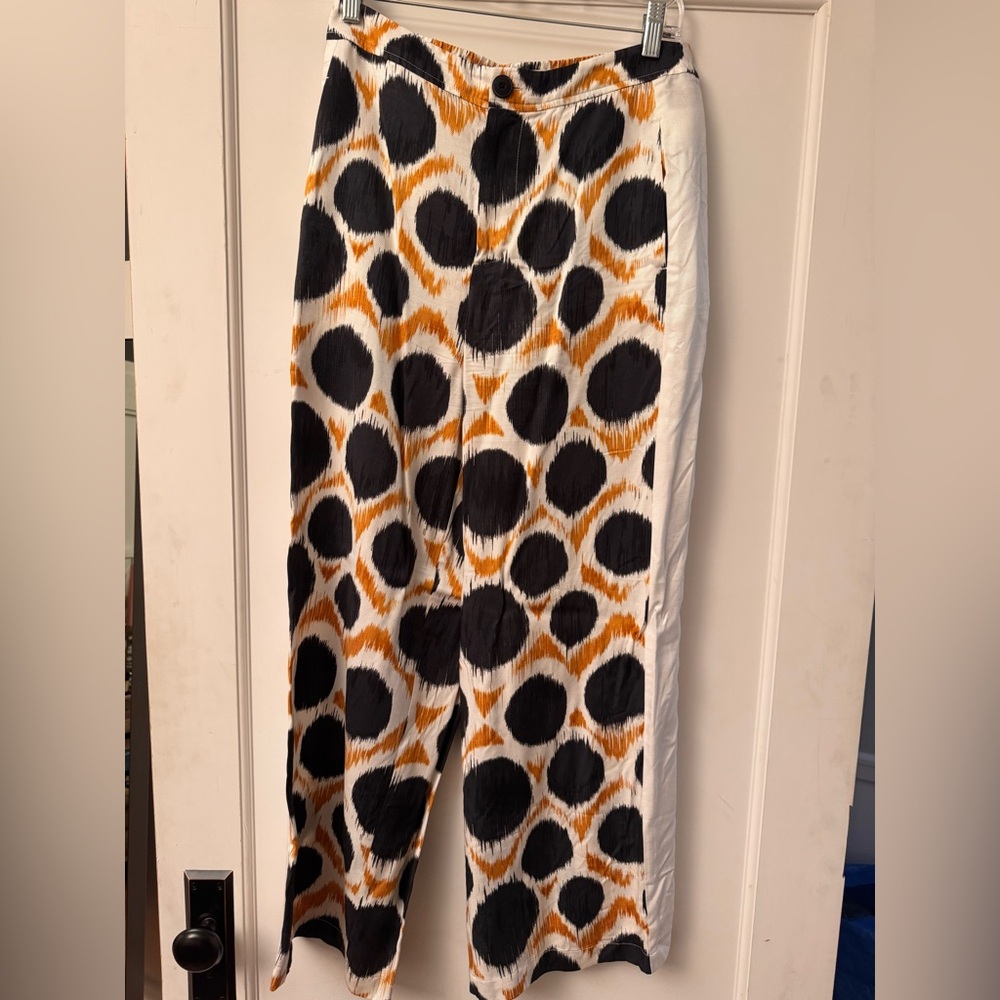 Anthropologie Black and Orange Patterned Pants
